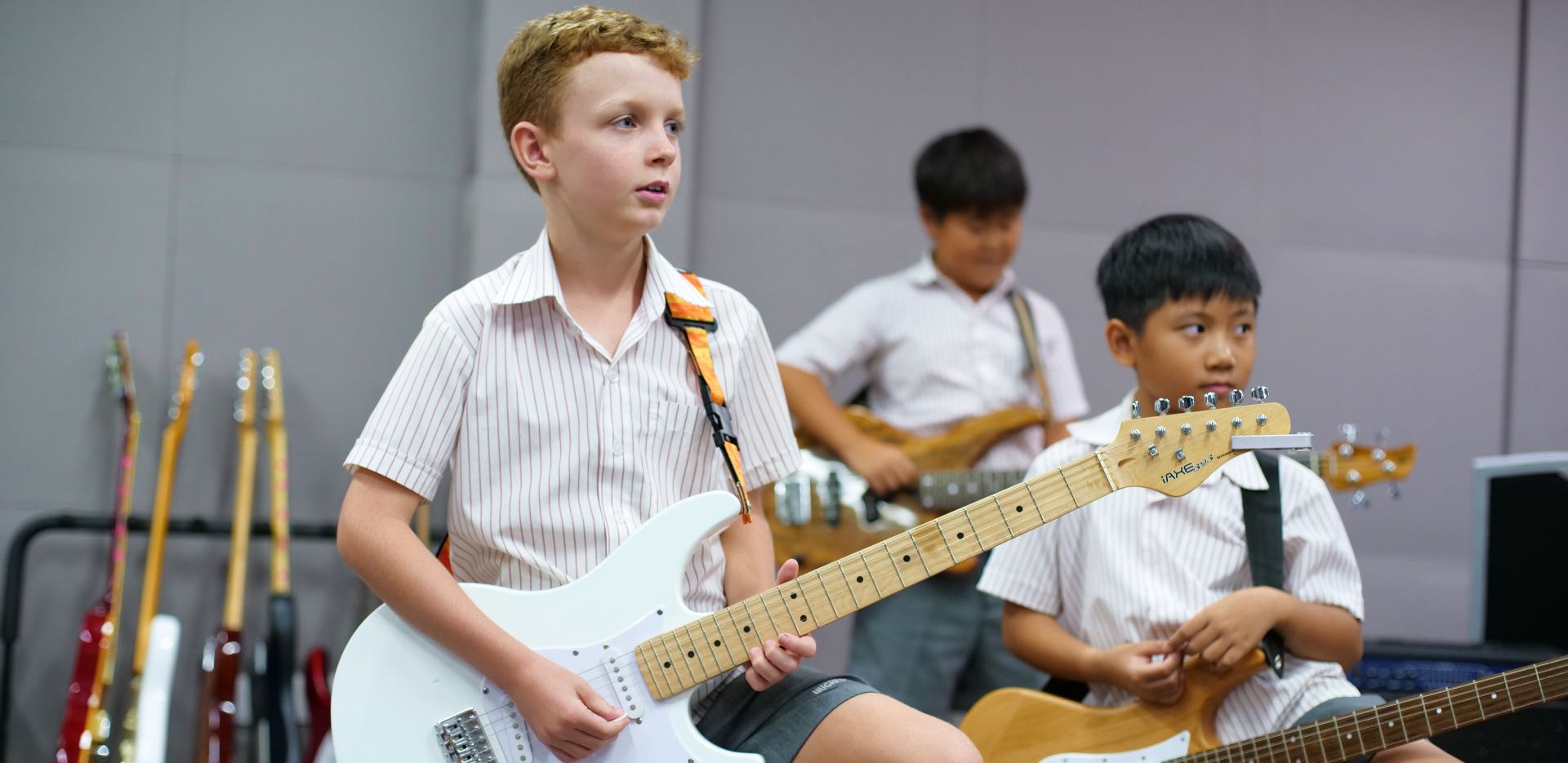 Child playing guitar 